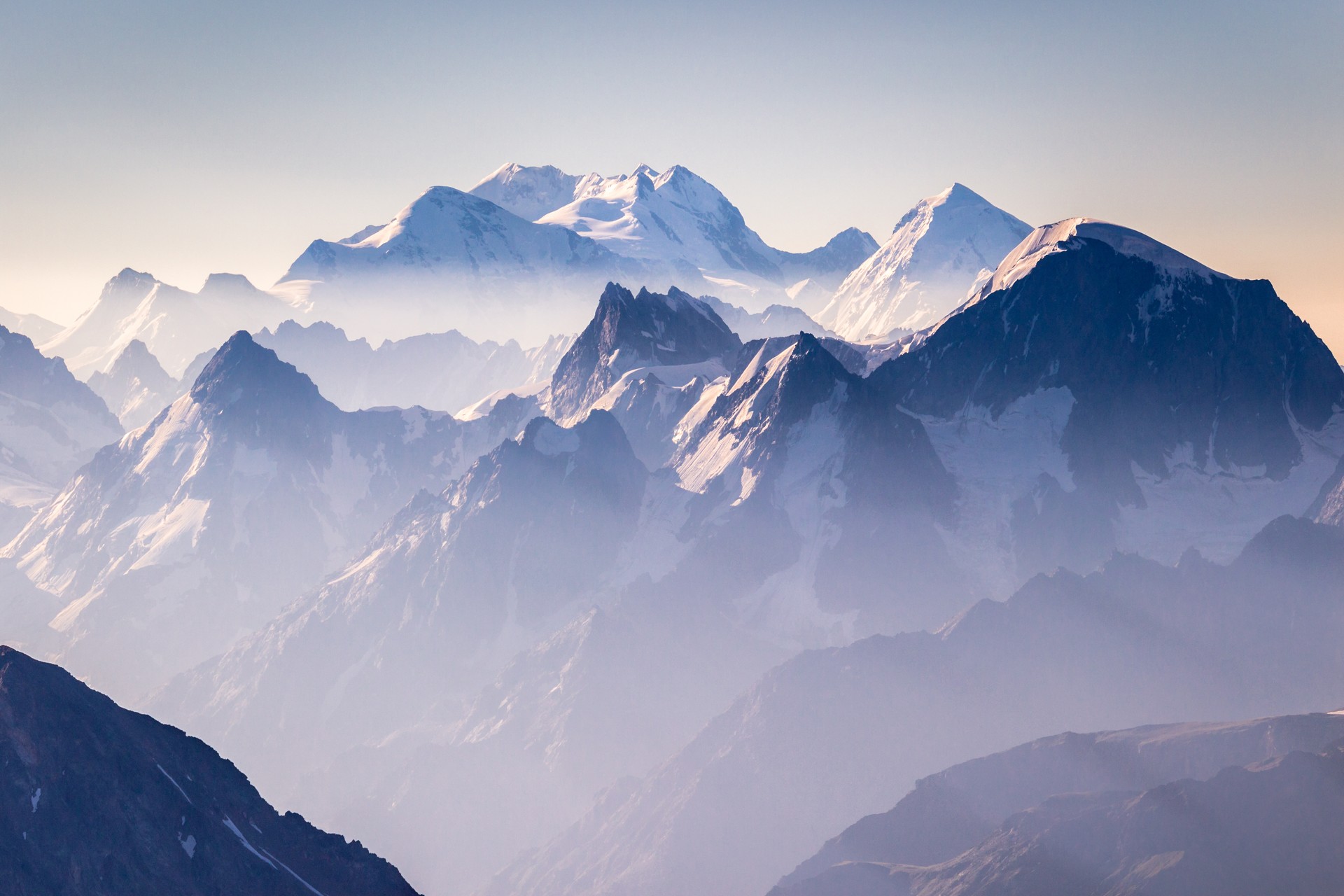 Misty blue mountains on sunrise